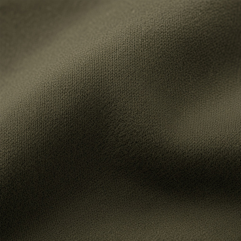 Olive green fleece knit fabric texture close-up for plus size loungewear and sweatsuit
