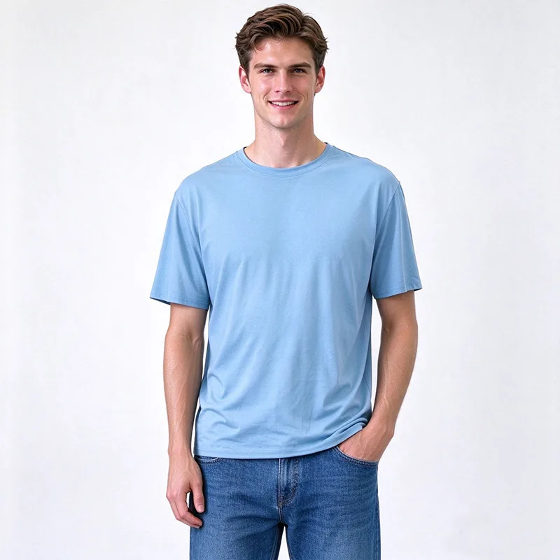 Male model in light blue UPF 50+ short sleeve t-shirt pairing with jeans — 100% polyester 120gsm UV protection men's t-shirt bulk supplier
